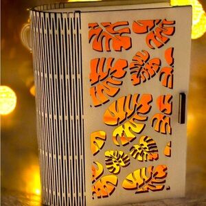 Faux book - wood look - keepsake box with tropical leaf pattern.